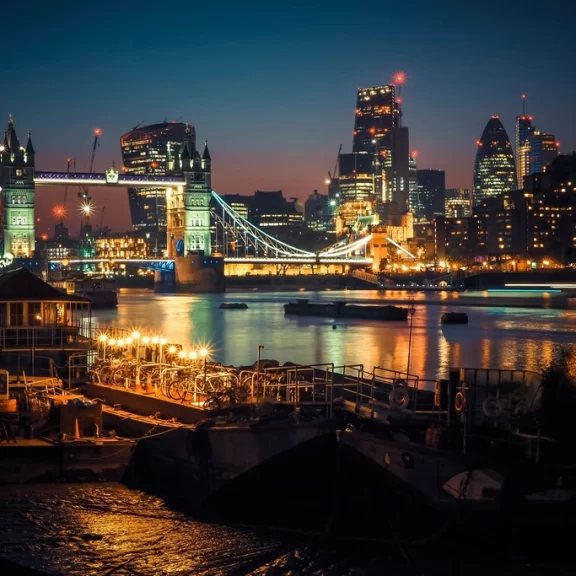 Tower Bridge in London lit up at night